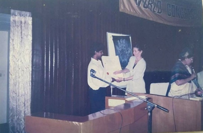 Prof.C.UNNIKRISHNAN receves certificate  from Dr.LINDA (UNITED KINGDOM)